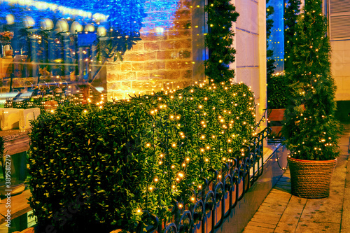 Street restaurant window decoration for new year and Christmas