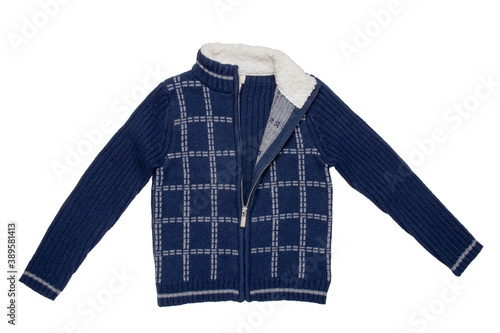 Autumn and winter children clothes. A cozy warm dark blue cardigan or jacket with a white checkered pattern for the little boy isolated on a white background. Kids spring fashion.