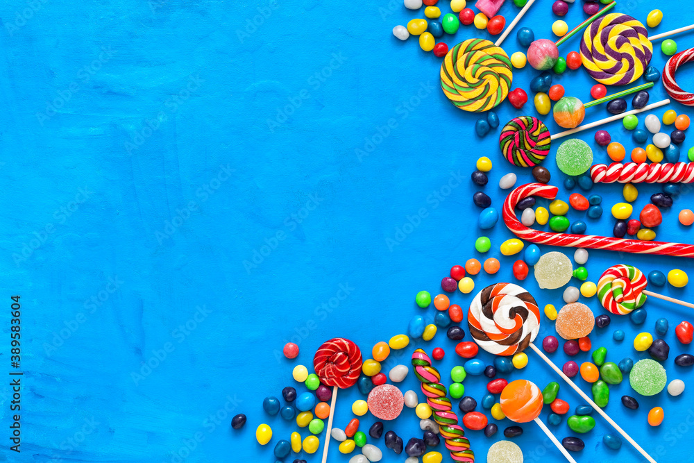 Collection of various candies and sweets on a blue background. Top view, flat lay, copy space. Collection of various candies and sweets on a blue background. Top view, flat lay, copy space.