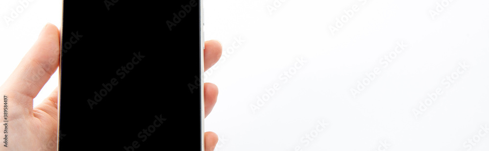 female hand holding new modefemale hand holding new modern black smartphone isolated on white background, close view rn black smartphone isolated on white background, close view . High quality photo female hand holding new modefemale hand holding new modern black smartphone isolated on white background, close view rn black smartphone isolated on white background, close view . High quality photo