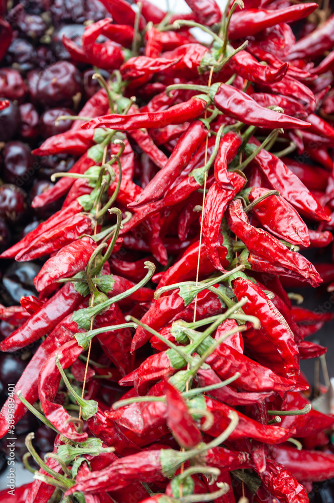 Dried red chili paprika hang in bunch. Dried red chili paprika hang in bunch.