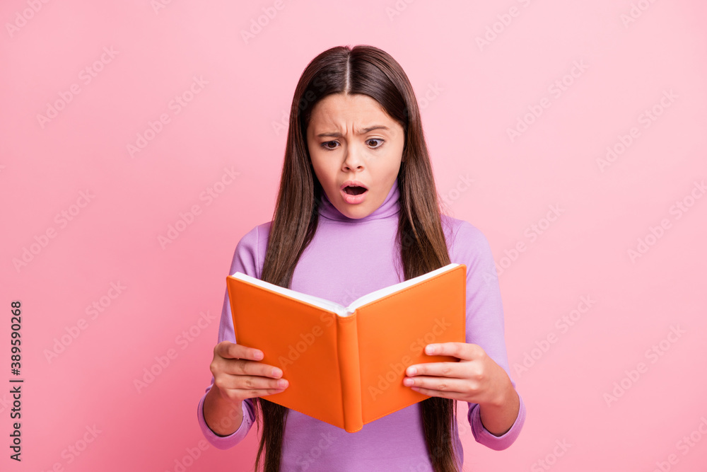 Portrait of her she nice attractive pretty worried depressed long-haired girl reading academic paper book library diary bad news isolated over pink pastel color background Portrait of her she nice attractive pretty worried depressed long-haired girl reading academic paper book library diary bad news isolated over pink pastel color background