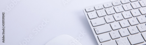 new modern keyboard witnew modern keyboard with computer mouse and smartphone isolated on white background, close view h computer mouse and smartphone isolated on white background, close view . High