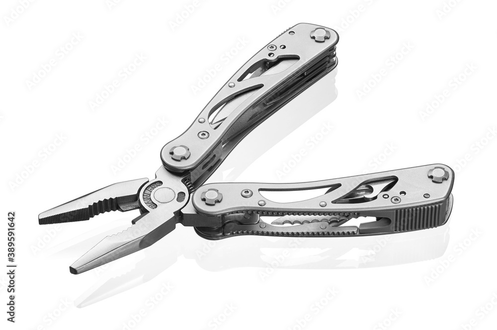 Multi tool with expanded tools and pliers isolated on a white background Multi tool with expanded tools and pliers isolated on a white background