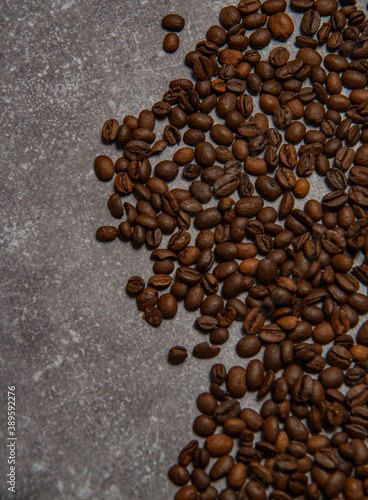 roasted coffee beans and a cup of coffee