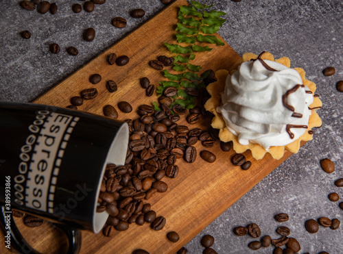 sweet cake and cup of coffee, coffee beans