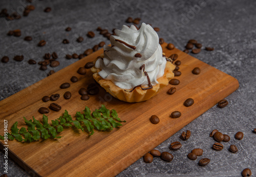 sweet cake and cup of coffee, coffee beans
