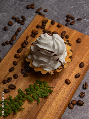sweet cake and cup of coffee, coffee beans