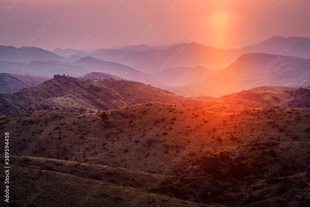 Sunset over the rolling hills of the Gamsberg pass in central Namibia