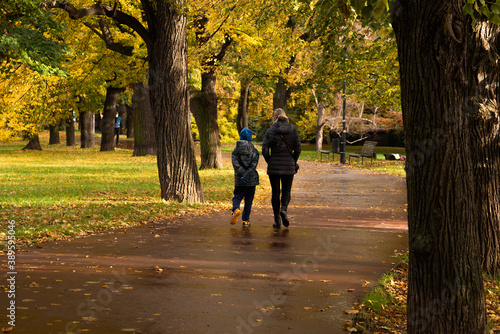 Photography Mother and son are walking and talking on Letna Park in Autumn 2020 on Prague 6,