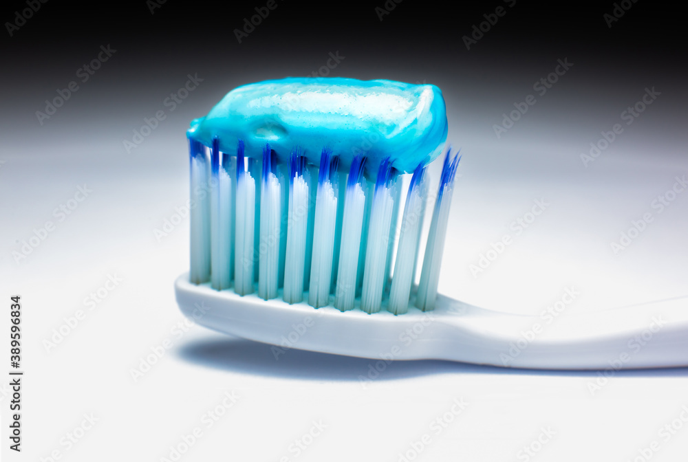 Toothbrush with toothpaste close up. Cleaning teeth concept. Toothbrush with toothpaste close up. Cleaning teeth concept.