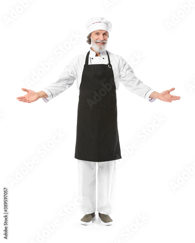 Mature male chef on white b...