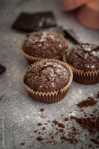  Chocolate muffins with powdered sugar