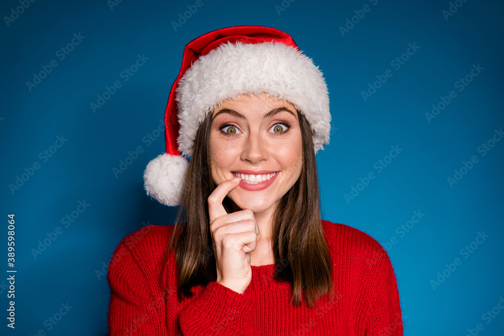 Photo funky girl santa claus hat celebrate x-mas christmas newyear party wait season tradition discount touch finger teeth wear knitted sweater isolated gradient blue color background Photo funky girl santa claus hat celebrate x-mas christmas newyear party wait season tradition discount touch finger teeth wear knitted sweater isolated gradient blue color background