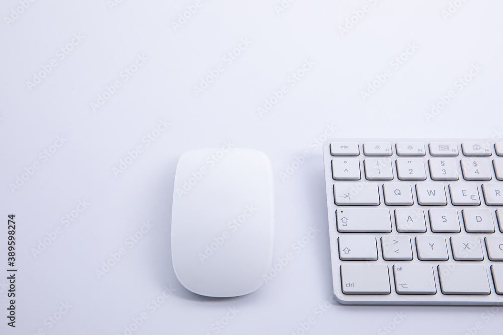 new modern keyboard with computer mouse isolated on white background, close view . High quality photo new modern keyboard with computer mouse isolated on white background, close view . High quality photo