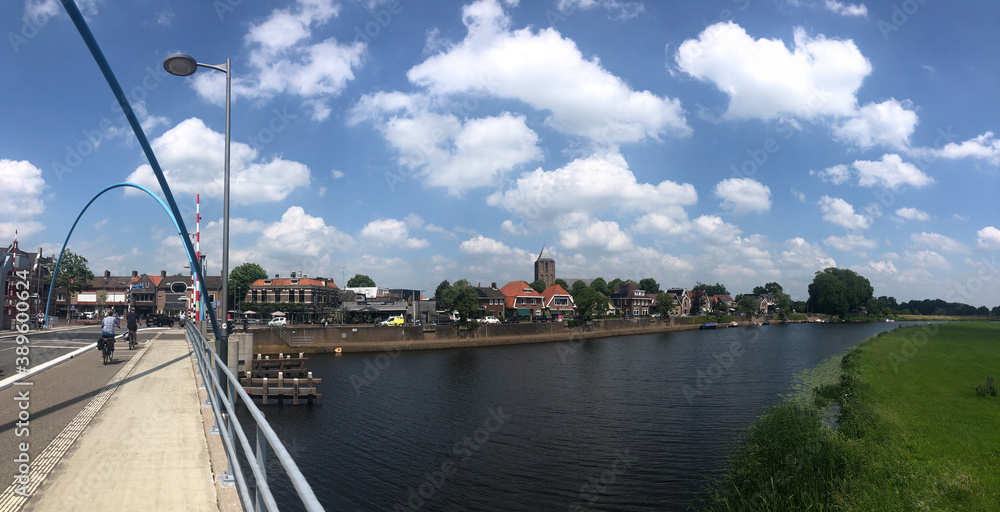 Obraz premium Dalfsen and a bridge over the river Vecht