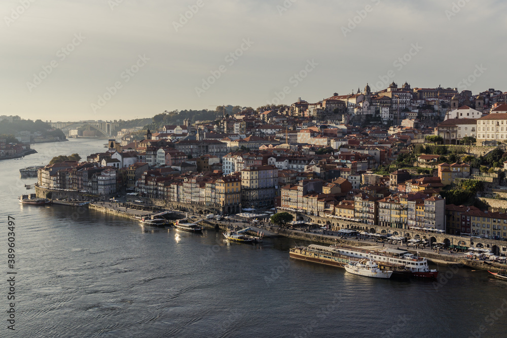 Panoramic view of Porto old Town, the Ribeira and the Douro River, during the sunset.
