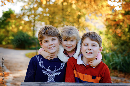 Fotografie Portrait of three siblings children
