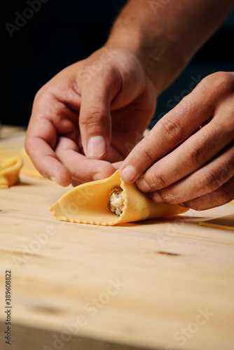 Process of preparing home-cooked raviolis on the table.