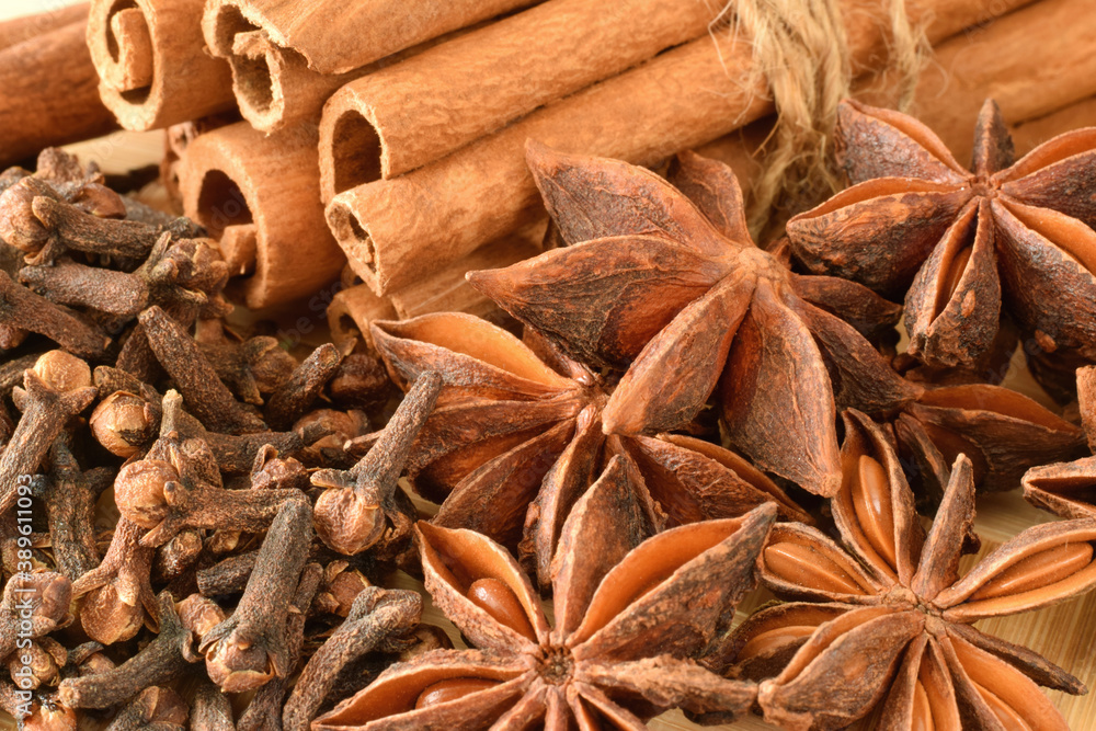 cinnamon sticks, anise stars, cloves close up food background cinnamon sticks, anise stars, cloves close up food background