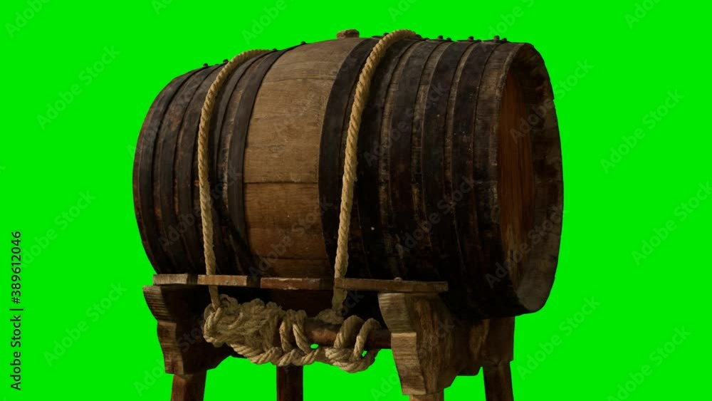 Wooden barrel for wine or beer at green chromakey background Wooden barrel for wine or beer at green chromakey background