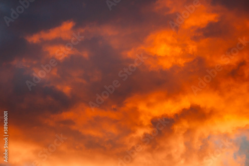 Sunrise Bright Dramatic Sky. Scenic Colorful Sky At Dawn. Sunset Sky Natural Abstract Background In Red Orange Colors.