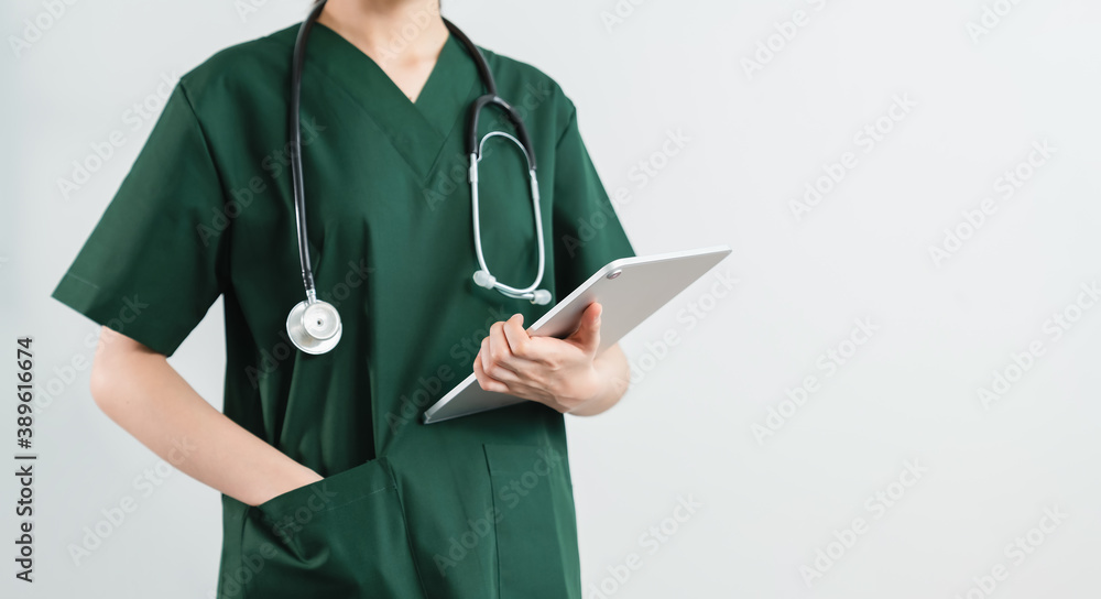 Doctor stands with stethoscope and digital tablet on the white background. Doctor stands with stethoscope and digital tablet on the white background.