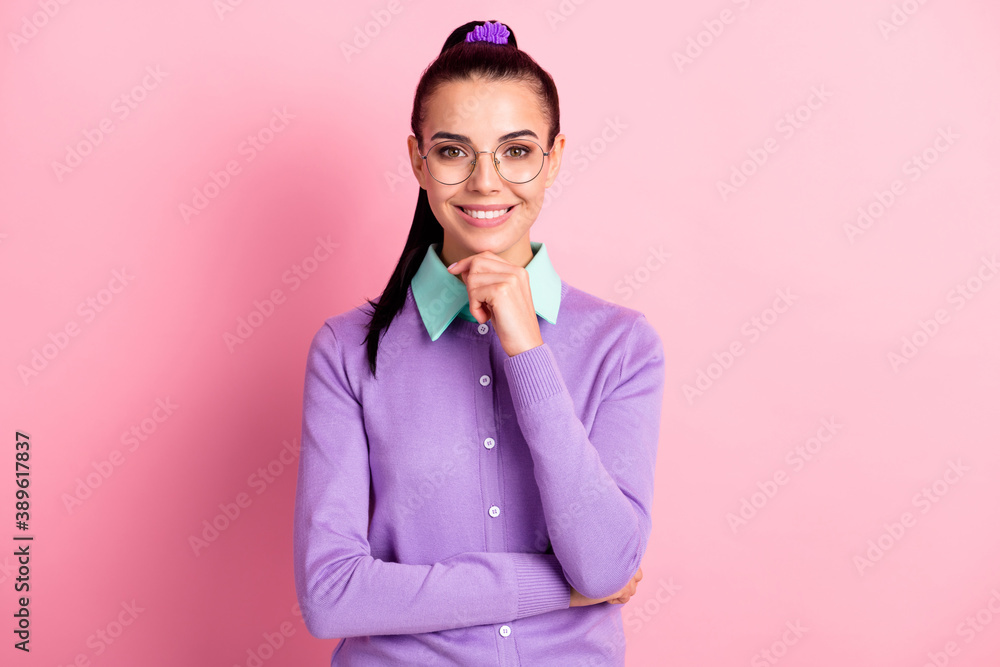 Photo of cute woman tail hairstyle look camera hand chin confident wear spectacles violet cardigan isolated pink color background