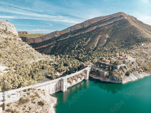 The beautiful spanish canyon Chulilla and its dam from above shot with a drone