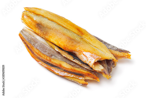 Dried salted fishes on white background