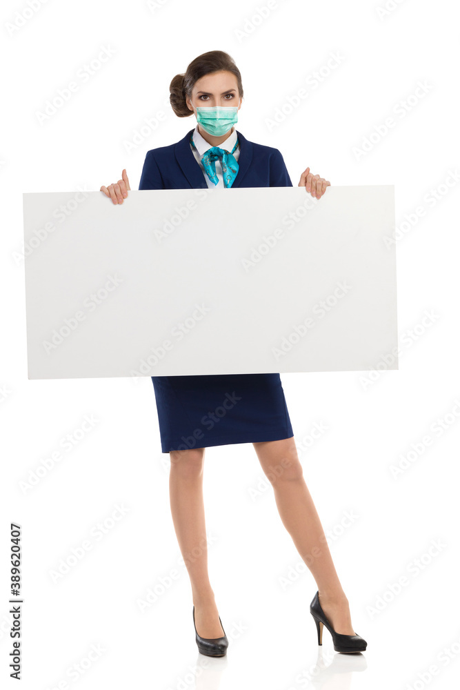 Smiling Stewardess Is Presenting Blank Poster Smiling Stewardess Is Presenting Blank Poster