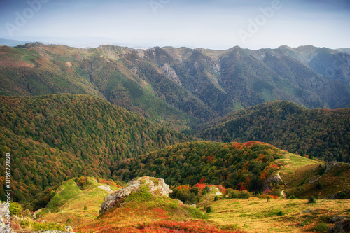 Beautiful autumn mountain view and landscapes from the path from Ribaritsa to Eho hut chalet and peaks Yumruka and Kavladan, Central Balkan, Teteven, Bulgaria photo