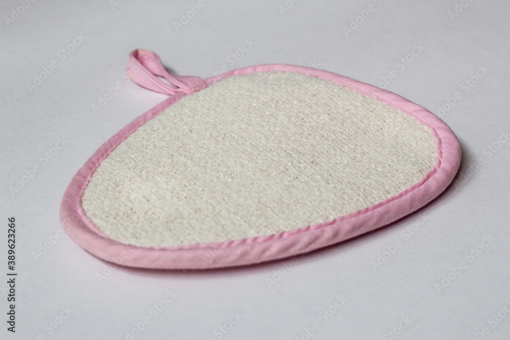 Pink peeling sponge for face. Bath accessories. Pink peeling sponge for face. Bath accessories.