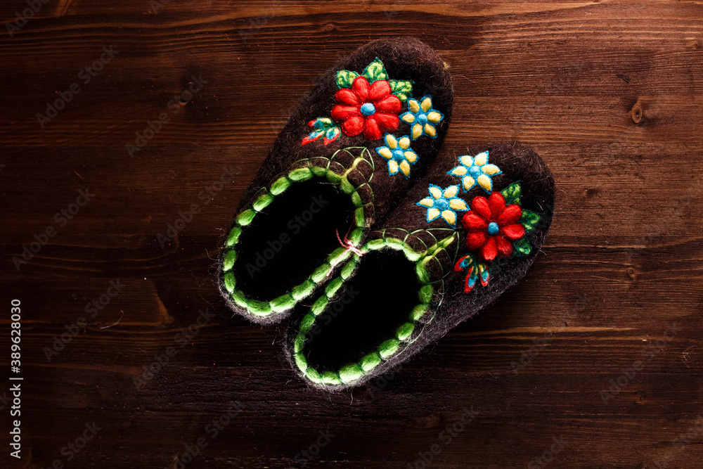 Slippers made of wool,embroidered by the method of felting Slippers made of wool,embroidered by the method of felting