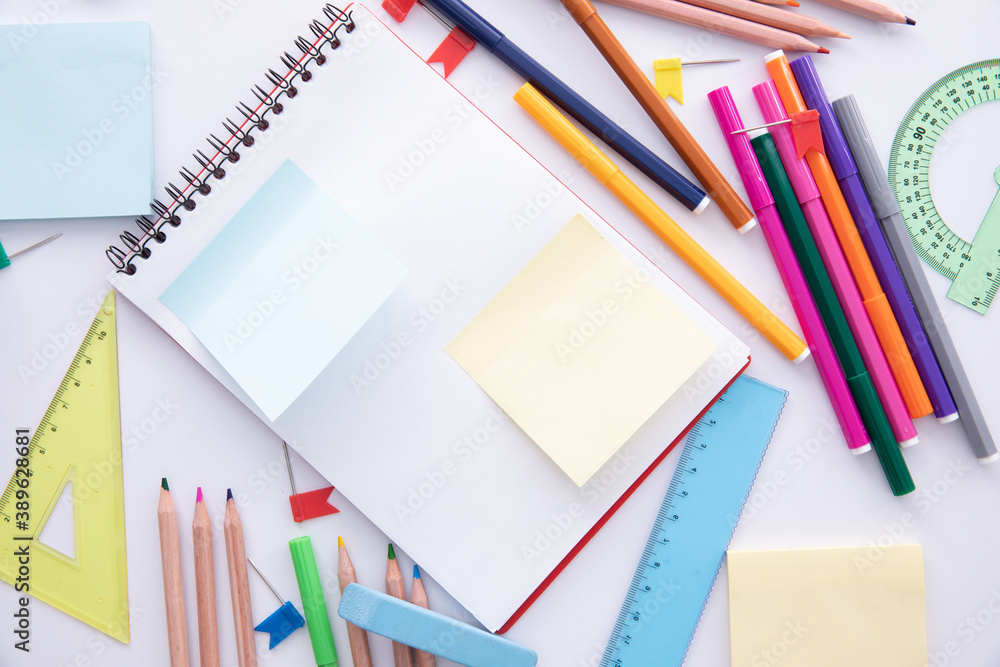 collection of bright colorful stationery on light background, close view . High quality photo collection of bright colorful stationery on light background, close view . High quality photo