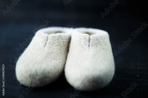 Slippers made of wool,embroidered by the method of felting