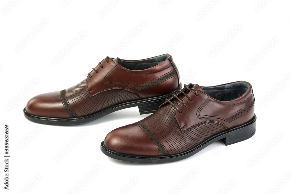 Classic brown leather shoes on a white background
