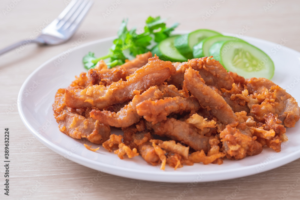 Fried pork with garlic and pepper on plate, Thai food. Fried pork with garlic and pepper on plate, Thai food.