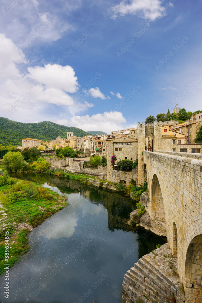 Upright photography of Besalu town with water reflection in Catalan, Spain
