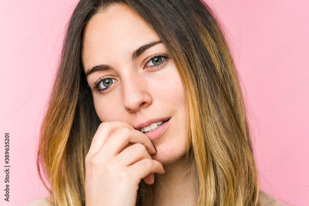 Young beautiful woman isolated on pink background Young beautiful woman isolated on pink background