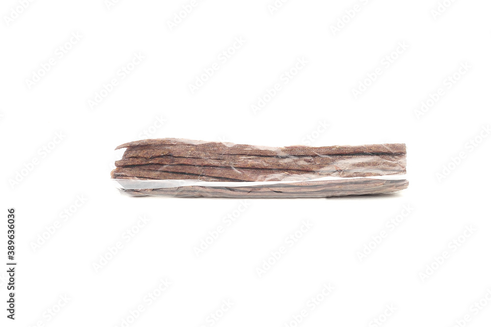 Packaging Dried beef meat sliced on stick, beer snack isolated on white background Packaging Dried beef meat sliced on stick, beer snack isolated on white background