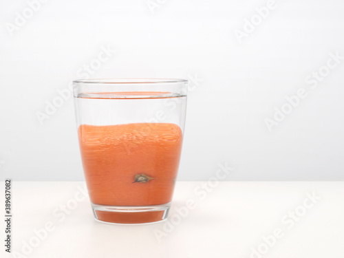 Wallpaper Mural Glass of orange and water. Refraction. Torontodigital.ca