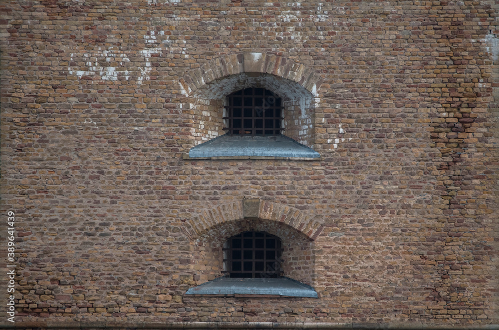 Windows on a old watch tower at a quay at the passage Oxdjupet in the Stockholm archipelago