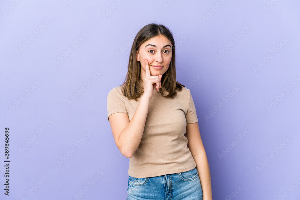 Young caucasian woman showing number one with finger. Young caucasian woman showing number one with finger.