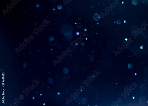 Photo of bokeh design light style new blue theme or cool color abstract pattern blurred background used in Christmas and New Year or celebretion.