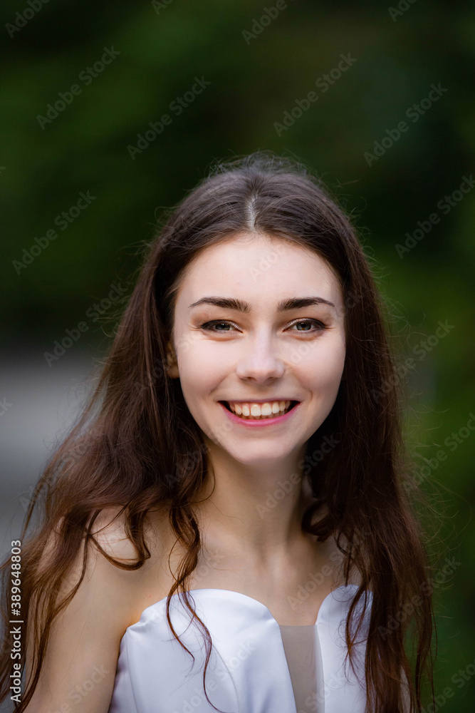 Portrait of a beautiful girl wearing white wedding dress happy smiling Portrait of a beautiful girl wearing white wedding dress happy smiling