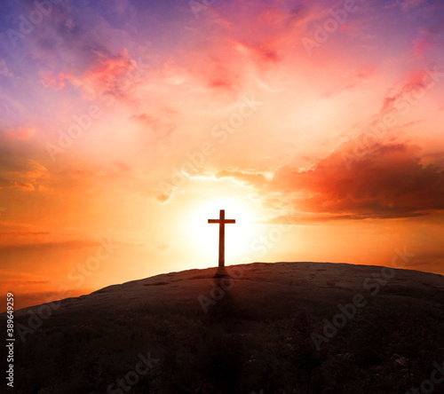 Valokuva Good Friday concept: Silhouette cross on  mountain sunset background
