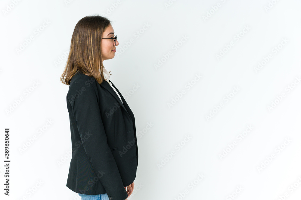 Young caucasian business woman gazing left, sideways pose. Young caucasian business woman gazing left, sideways pose.