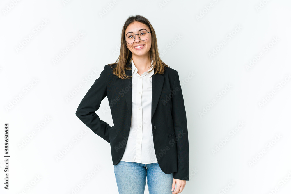 Young caucasian business woman happy, smiling and cheerful. Young caucasian business woman happy, smiling and cheerful.