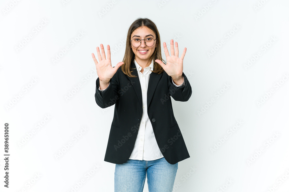 Young caucasian business woman showing number ten with hands. Young caucasian business woman showing number ten with hands.